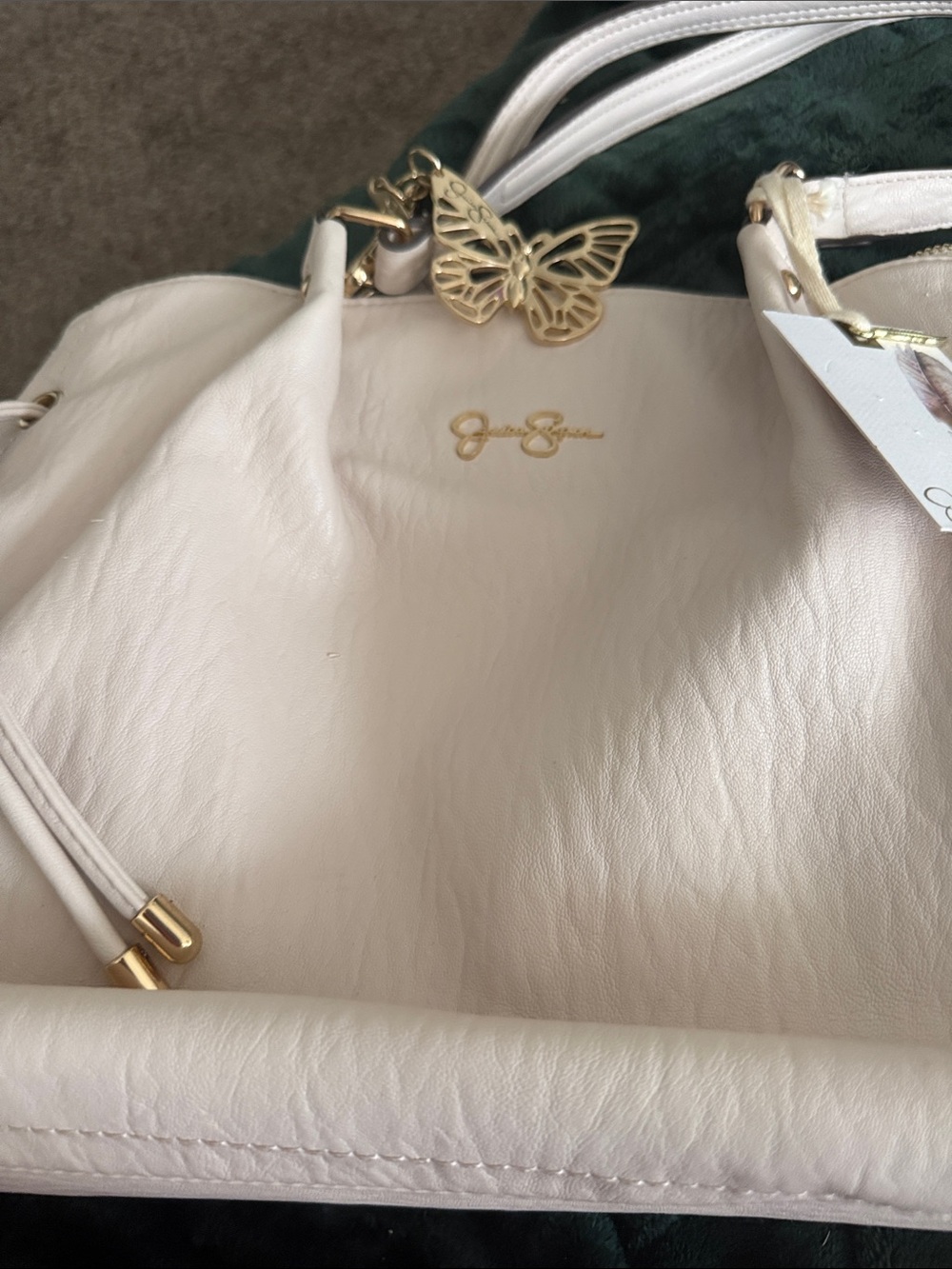 Jessica Simpson Cream Tote with Gold Butterfly Charm
